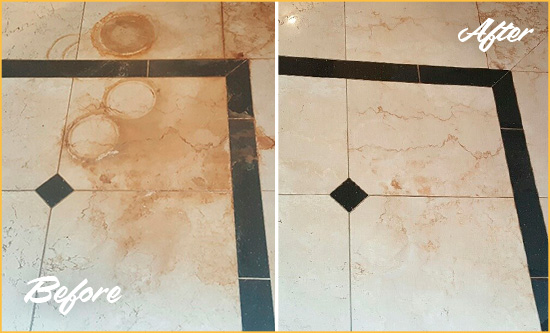 Before and After Picture of a Hialeah Gardens Hard Surface Restoration Service on a Marble Floor to Eliminate Rust Stains